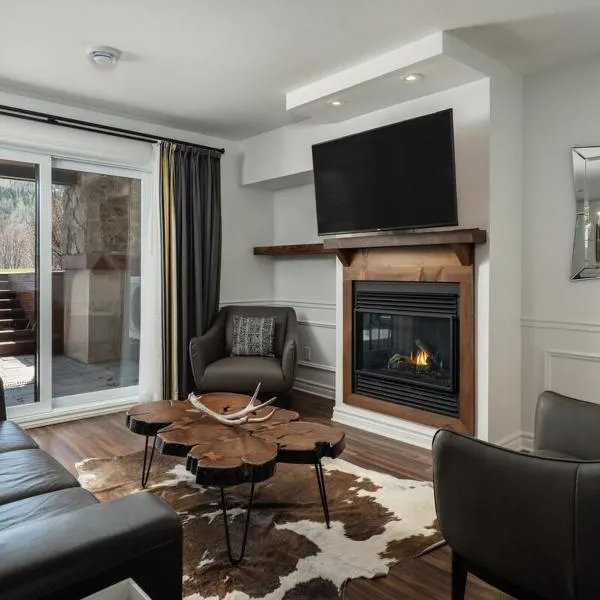 Luxury ski-in ski-out condo in St-Sauveur 2 bedrooms，位于圣索弗尔-德斯蒙特的酒店