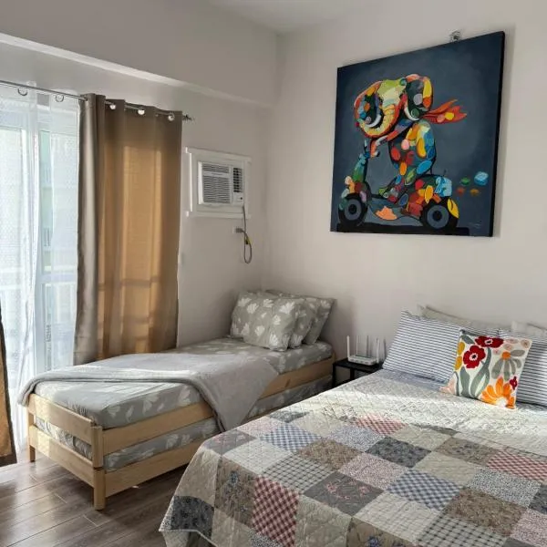 mira's condo unit in Amani Grand Residences near Mactan Int'l Airport,位于Mactan Cebu International的酒店
