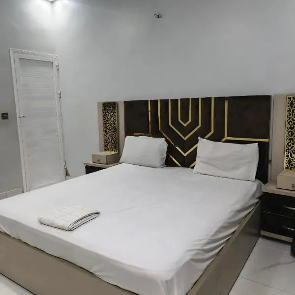 The Expo Inn Guest House Karachi Near Expo Centre，位于卡拉奇的酒店