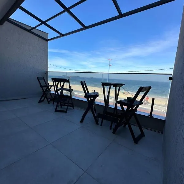 Pousada orla Mar，位于马里卡的酒店