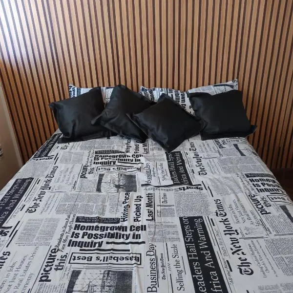 Suíte bem localizada, perto da praia, ar-condicionado e garagem，位于塞拉的酒店