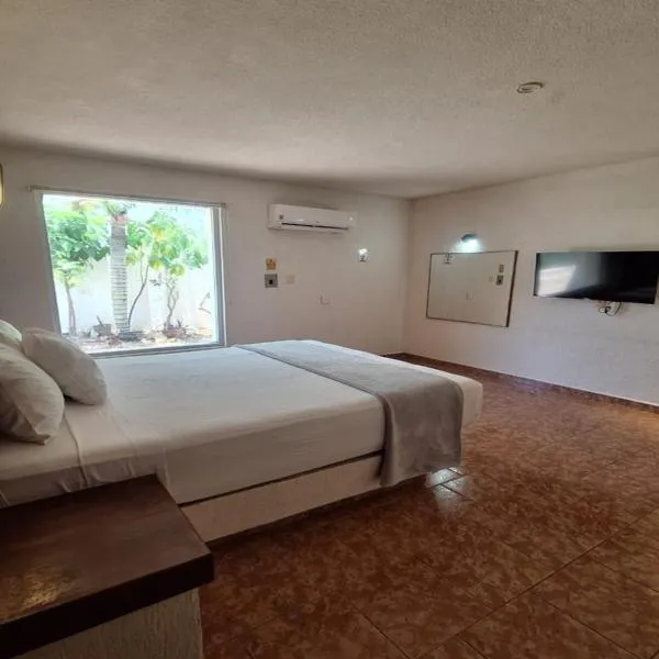 Capital O Hotel Rolovi Cancún，位于坎昆的酒店