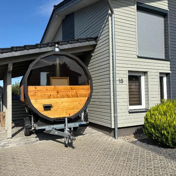Wood&Stone - Modernes Haus in Seenähe am Tankumsee mit Terrasse, Outdoorküche, Kamin, Homeoffice Bereich & voll ausgestatteter Küche im Naherholungsgebiet，位于伊森比特尔的酒店