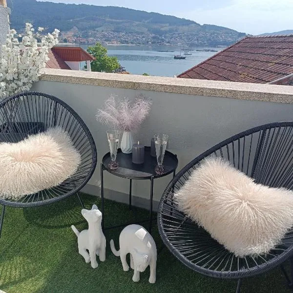 Rincón del Mar Terrazas y vistas a la Ría de Vigo，位于莫阿尼亚的酒店