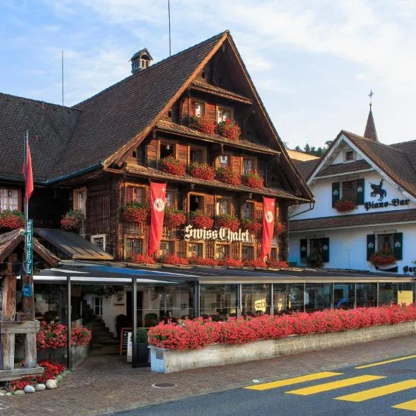 Swiss-Chalet Merlischachen - Historik Chalet-Hotel Lodge，位于屈斯纳赫特的酒店