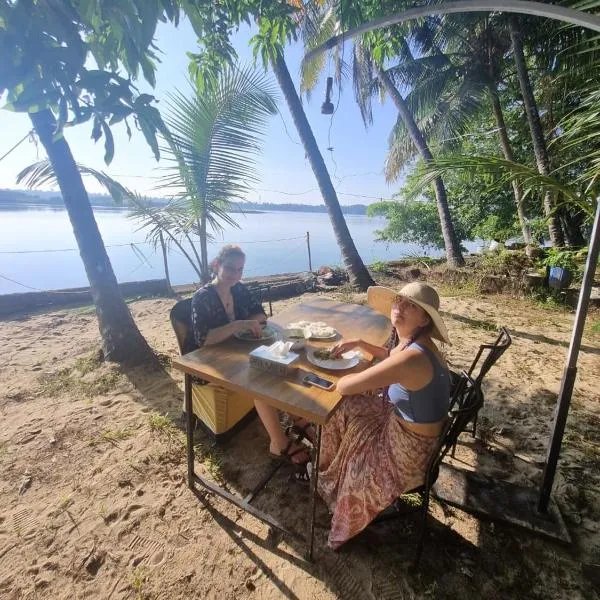 Green Island Homestay Riverside，位于科泽科德的酒店