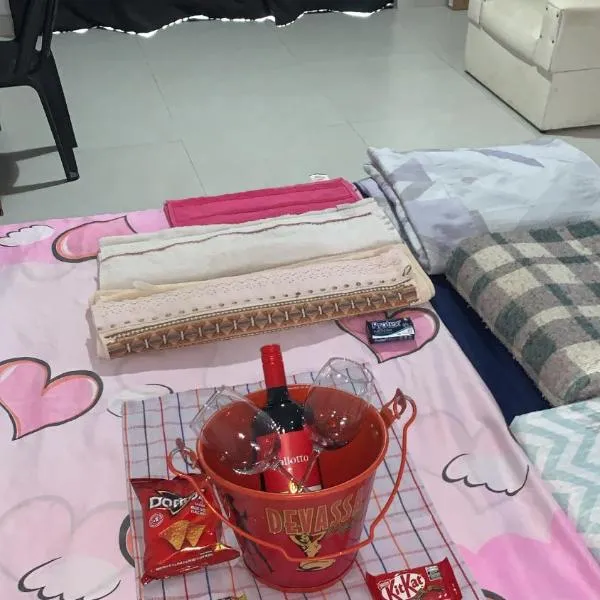 Casa ao lado da rodoviária com ar condicionado，位于阿拉鲁阿马的酒店