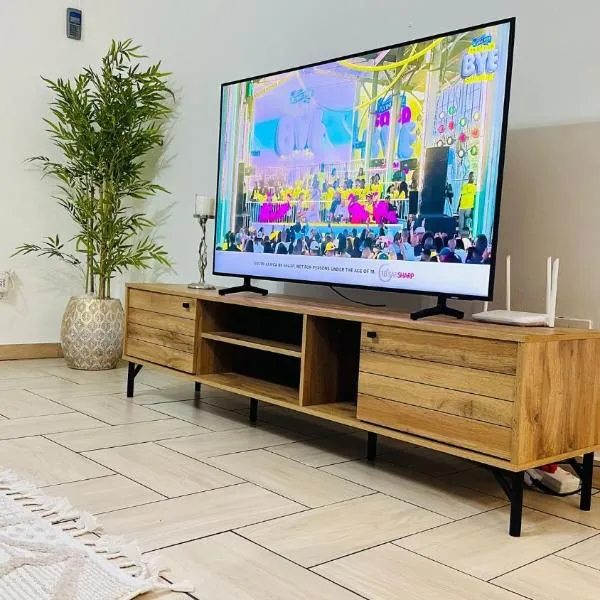 Exquisite Home & Living，位于Matsapha的酒店