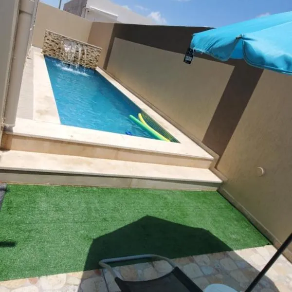 Maison avec piscine，位于Shanīnī的酒店