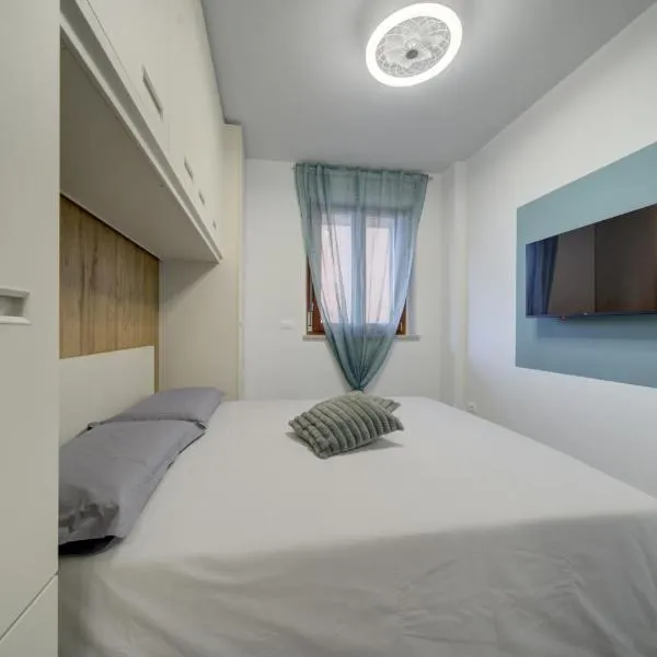 SGHouse appartamento con parcheggio gratuito，位于里沃利的酒店