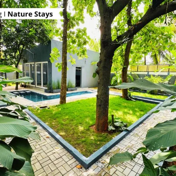 The Calms Villa by Travent Mug，位于Rāmanagaram的酒店