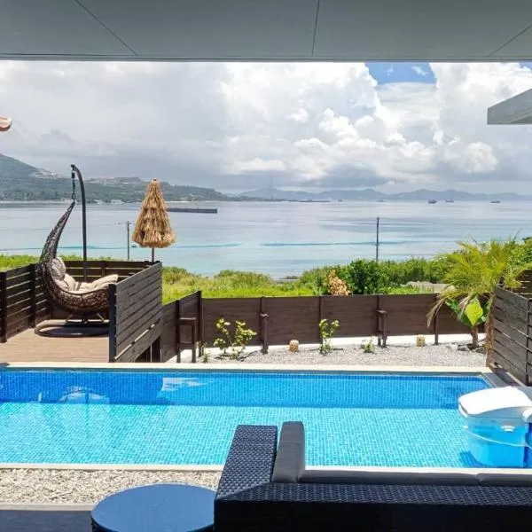 風の音，位于本部的酒店