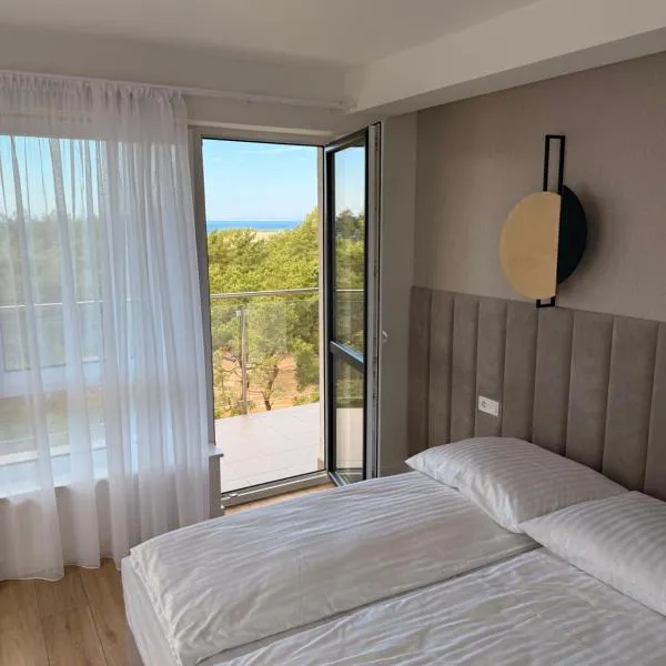 Apartamenty Solano z widokiem na morze，位于罗威的酒店