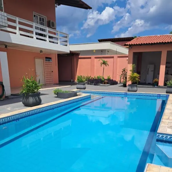 Casa Rosa Suítes 5 min de caminhada da PRAIA DA PONTA NGRA，位于马瑙斯的酒店