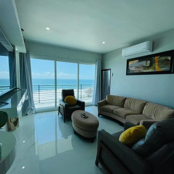 Triton's Cozy Condominium，位于Primo Tapia的酒店