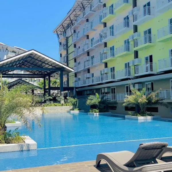 Condo unit near Mactan Airport with Pool, Gym, Free WiFi, and Netflix，位于Pusok的酒店