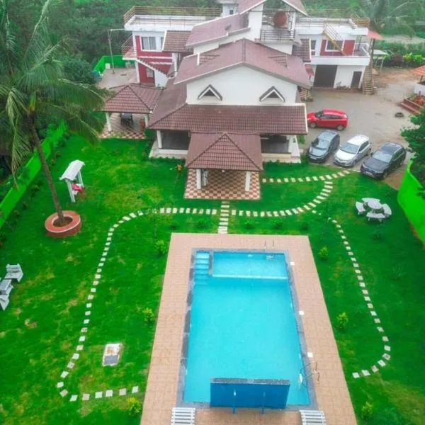 Hulihara Homestay - Pool, 4BH, Home Food, Estate，位于瑟格莱什布尔的酒店