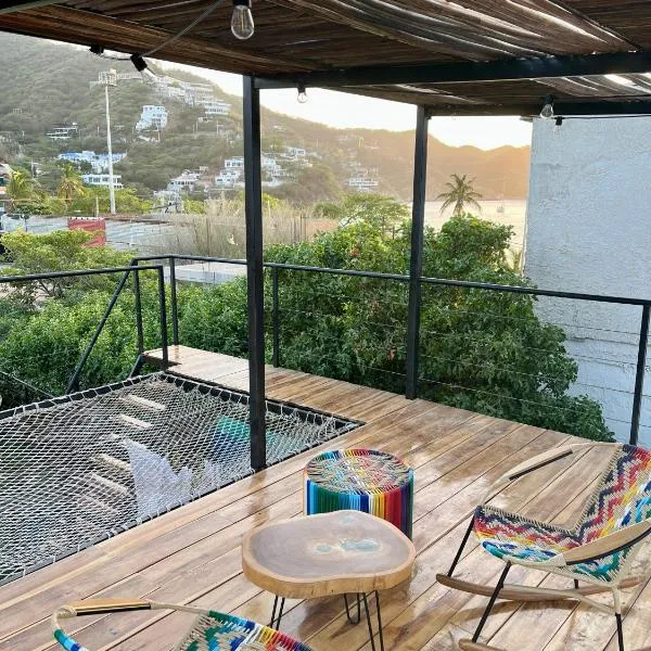 Ocean Lovers Hostel & Apartments，位于塔甘加的酒店