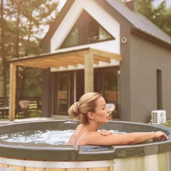 Osada pod Gwiazdami Łasko & SPA - Family ogrodzony dom, kominek, grill, ognisko, KAJAKI, Plaża, JEZIORA, opcja prywatnego JACUZZI，位于Łasko的酒店