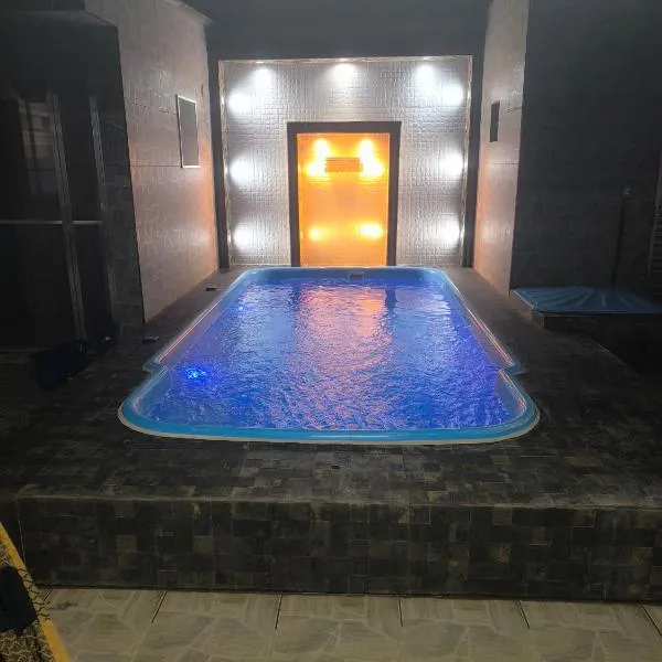 Casa Com Piscina Completa Ilha Comprida，位于伊利亚孔普里达的酒店