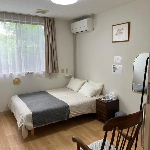 ゲストハウス假穂，位于舆论町的酒店