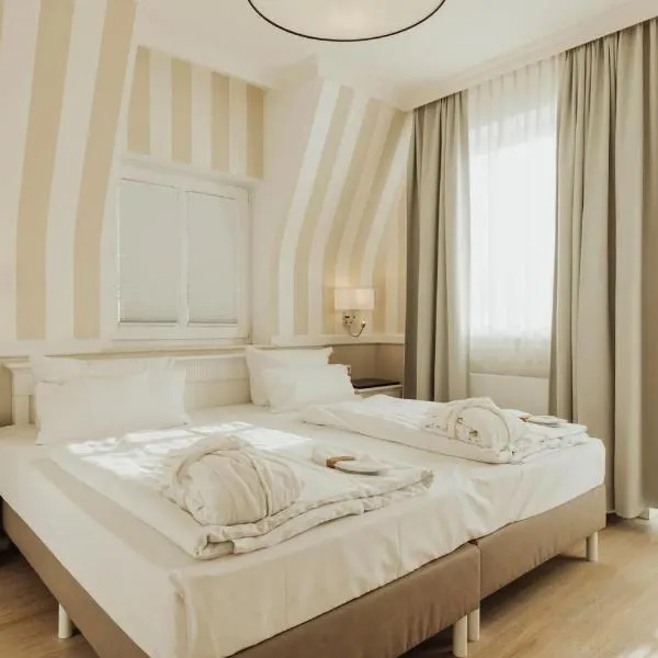 Villa Strandperle IV Jahreszeiten Kühlungsborn，位于奥斯赛拜-屈隆斯博恩的酒店