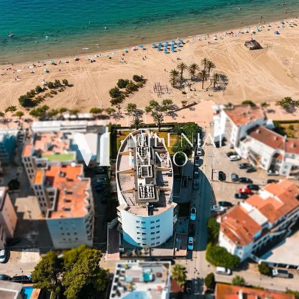 Milenial Marinapark - Apartamento a pie de playa con piscina y parking，位于罗萨斯的酒店