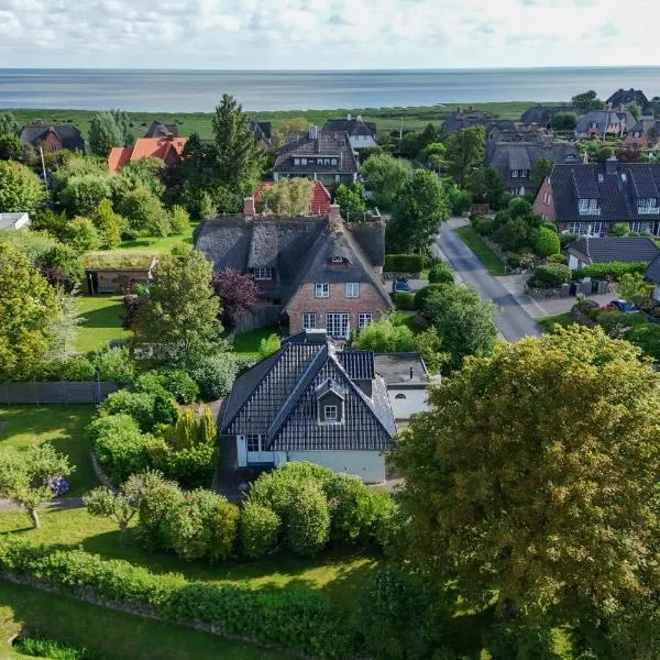 Watthüs Morsum mit Kamin und traumhaftem Garten，位于摩尔苏姆的酒店