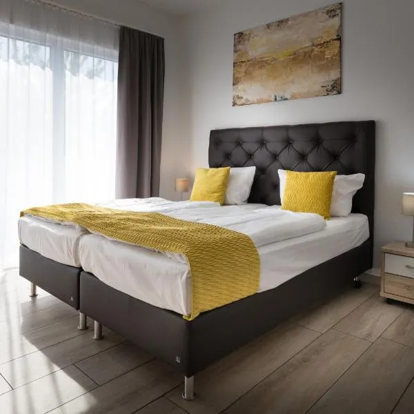 GLEUEL INN - digital hotel & serviced apartments & boardinghouse mit voll ausgestatteten Küchen，位于许尔特的酒店