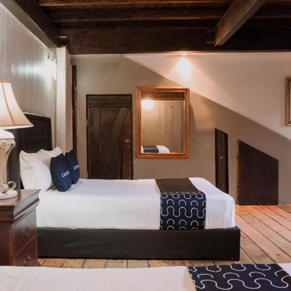 Capital O Hotel Villa Azura，位于特卡特的酒店