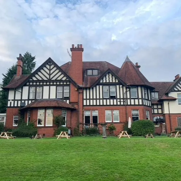OYO Dunmar House Hotel，位于阿洛厄的酒店