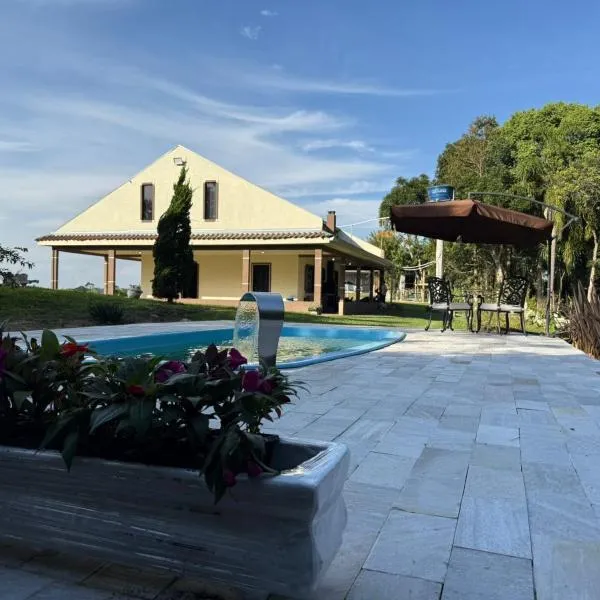 Casa de Campo proximo a Curitiba em Mandirituba CHACARA VILLAVERLA，位于Mandirituba的酒店