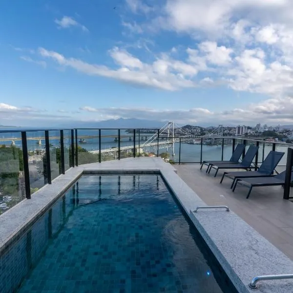 The Bridge by Xtay - Estúdio completo com Wi-Fi rápido, piscina, academia e próximo a praia，位于弗洛里亚诺波利斯的酒店