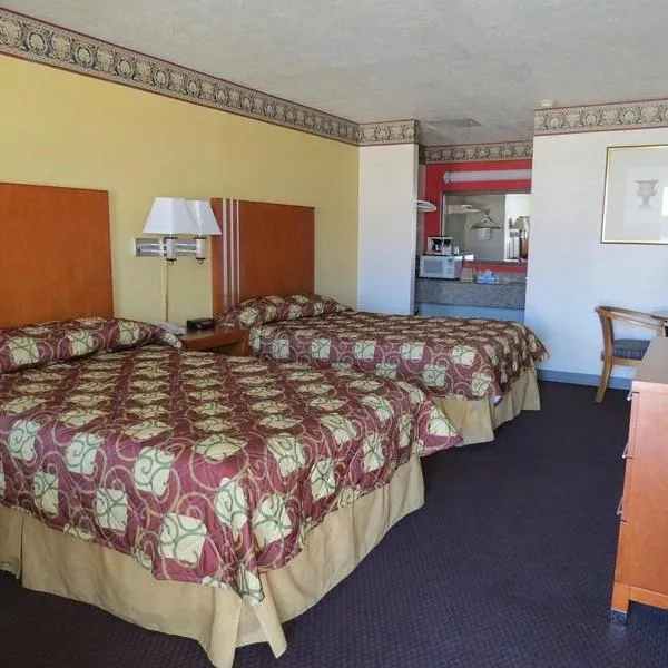 Winnie Inn Suites & RV Park，位于温尼的酒店