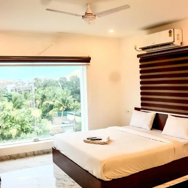 Hotel Rhythms Chennai near TradeCentre,Miot,DLF,L&T，位于加姆布的酒店