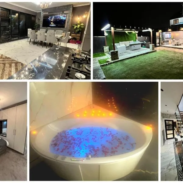 Elegant 6 bedroom Family Home, 2x corner Jacuzzi bath in LUTON，位于卢顿的酒店