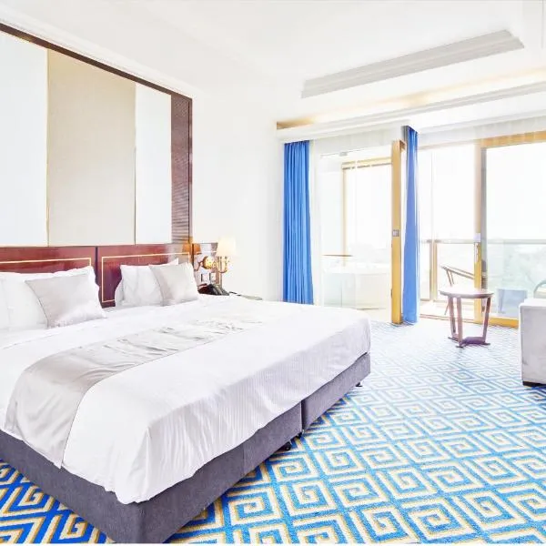 GoldOne Hotel & Suites，位于西归浦市的酒店