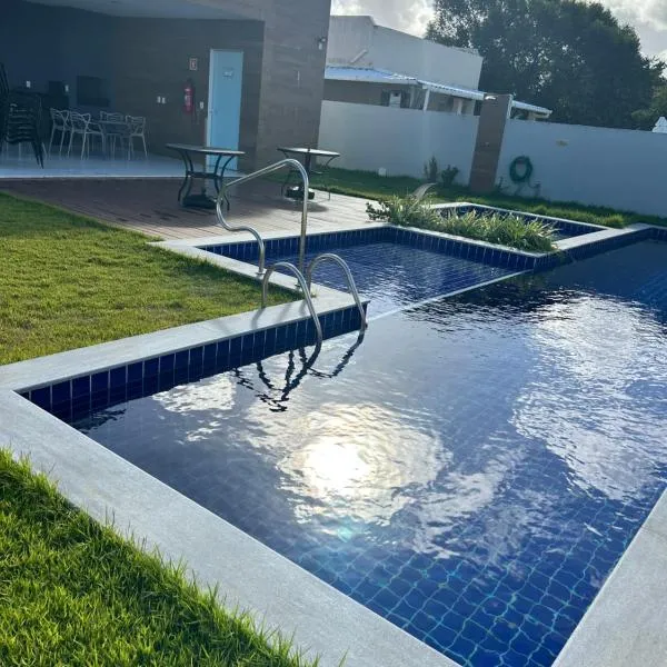 Village em Barra do Jacuípe，位于卡马萨里的酒店