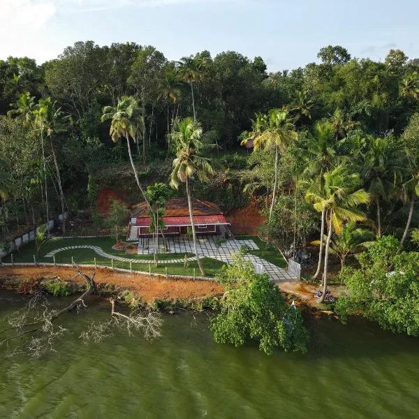 Anoop's Lake View Cottage -2BHK，位于Munroe Island的酒店