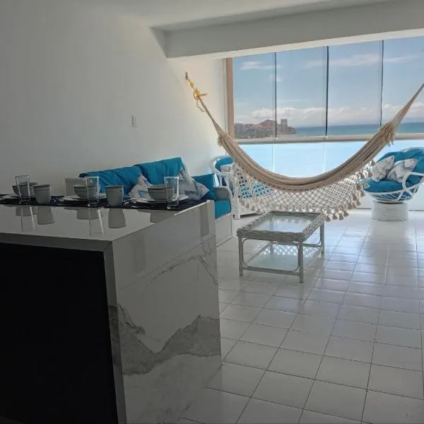Apartamento de lujo frente al mar en residencia con piscina, planta electrica y gym，位于波拉马尔的酒店
