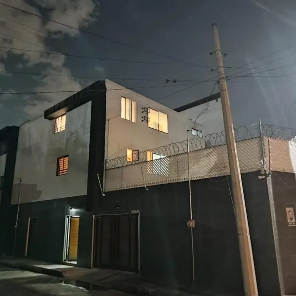 Hotel Origins，位于乔卢拉的酒店