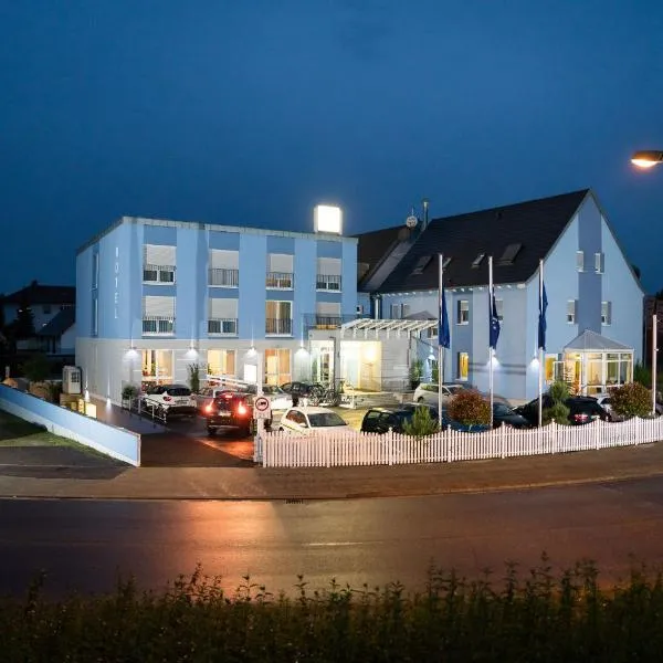 莱茵瓦特酒店，位于莱茵河畔韦尔特的酒店