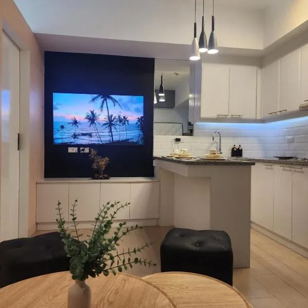 Modern Bright Cozy Stylish 1BR Venice BGC Balcony，位于马尼拉的酒店