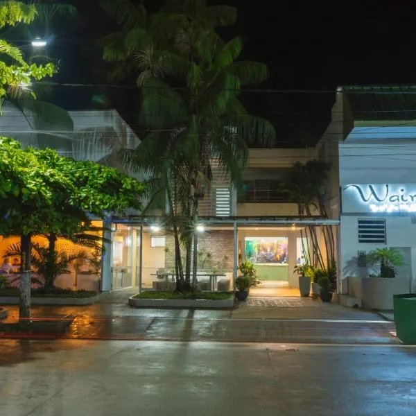 怀拉套房酒店，位于莱蒂西亚的酒店