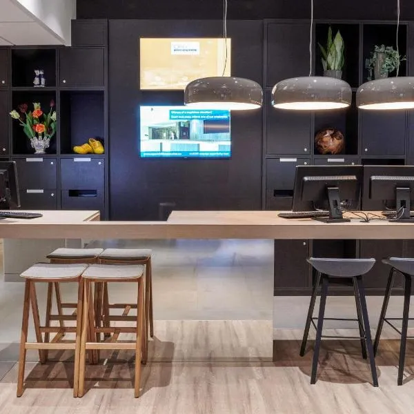 蒂尔堡中心美居酒店，位于蒂尔堡的酒店