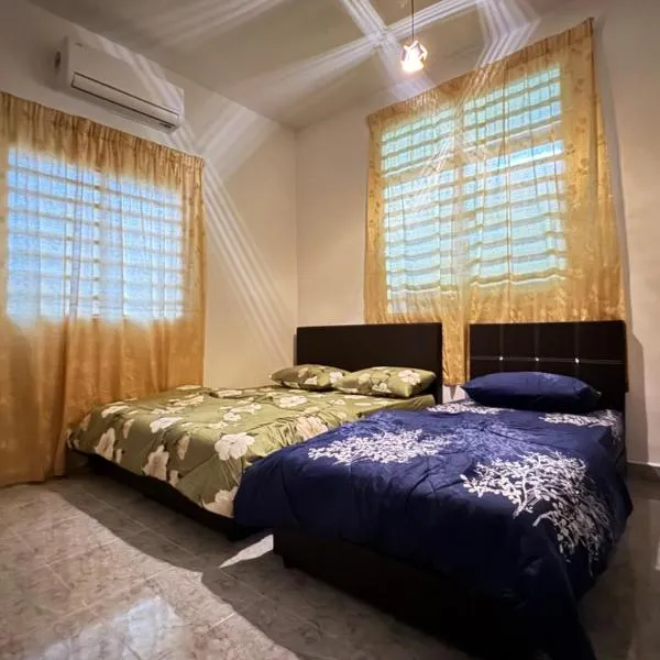 Cozy 4BR Homestay with 2 Baths Taman Seraya，位于居林的酒店
