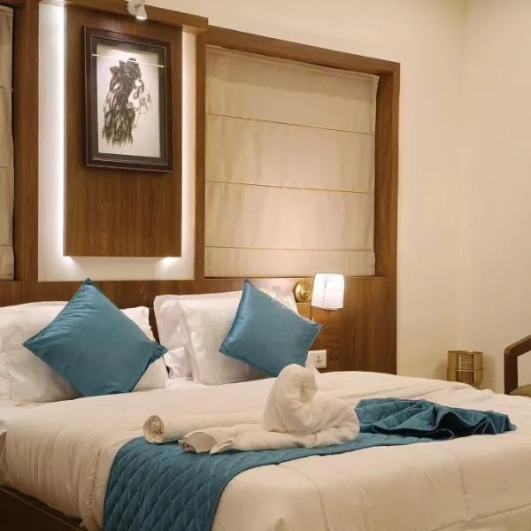 Radha Madhavam Apartment's，位于古鲁瓦尤尔的酒店