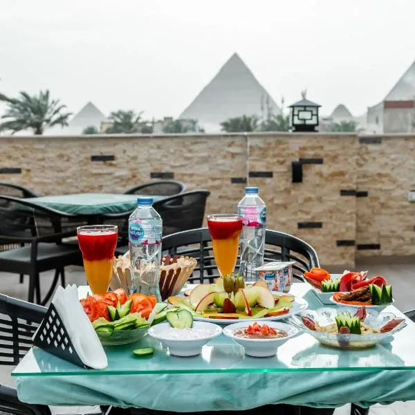 Night Pyramids Inn Hotel，位于开罗的酒店