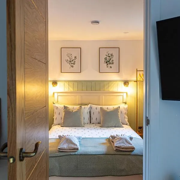 The Perk Inn, Cosy & Secluded Garden Lodge，位于浦耳的酒店