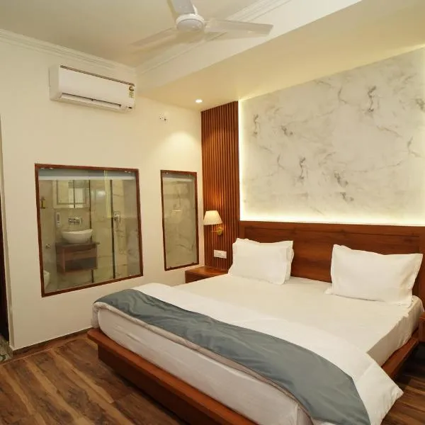 Hotel Premjees Paradise，位于索兰的酒店